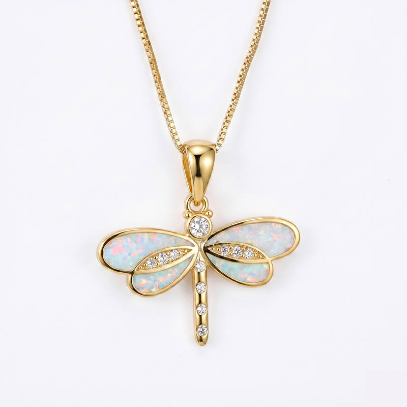 Dragonfly necklace in gold with small opal center. By Sophi.