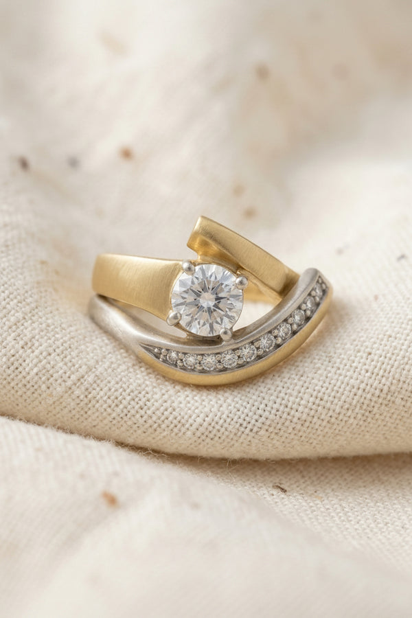 Vintage irregular gold and silver zirconia ring detail macro on neutral background