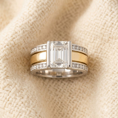 By Sophi Vintage Two-Tone Inlaid Crystal Glass Ring, flat-lay on warm cream wool