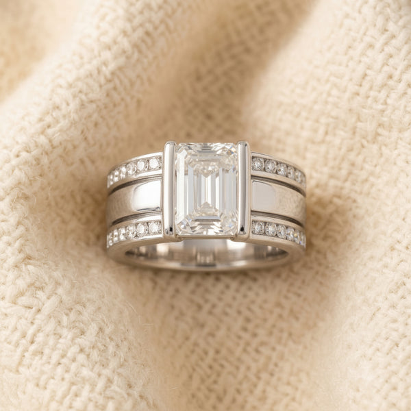 By Sophi Vintage Silver Emerald-Cut Crystal Ring, flat-lay on warm cream wool